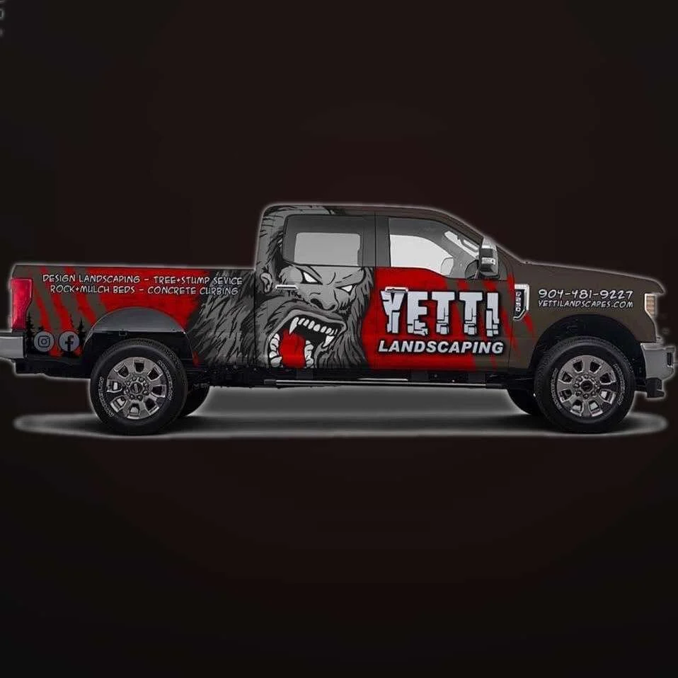 Yetti Landscaping wrapped pickup truck with the yeti mascot graphics